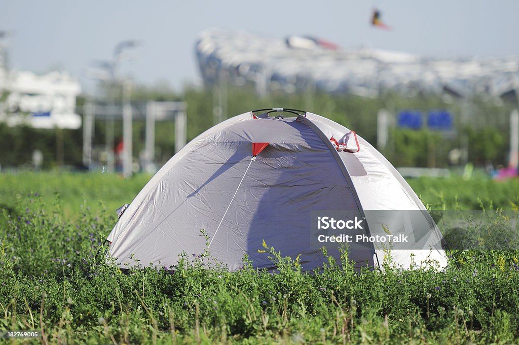 Outdoor Tent Camping - XLarge Outdoor Tent Camping on grass in city Camping Stock Photo