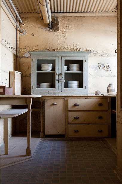 istock Old Kitchen Plates Counters Dishes Dirty Bad Cabinets 182769965