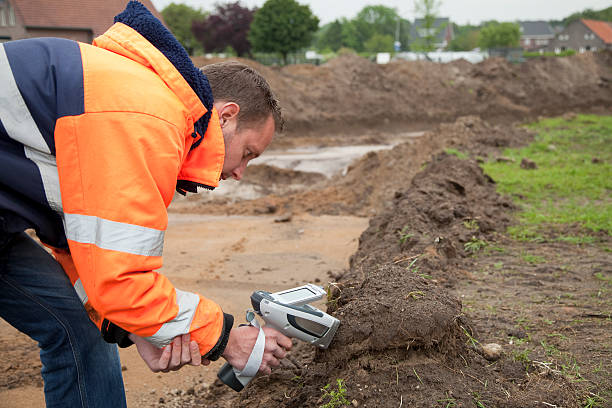 Analysing the soil with HXRF and taking samples, environmetal research.