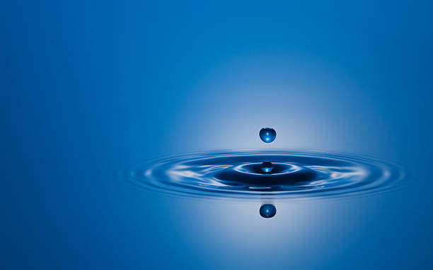 istock Closeup Stop Action Water Drop in Blue 182770104