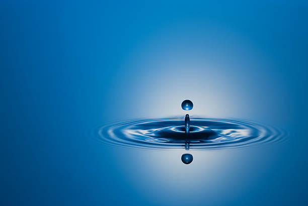istock Closeup Stop Action Water Drop in Blue 182770110