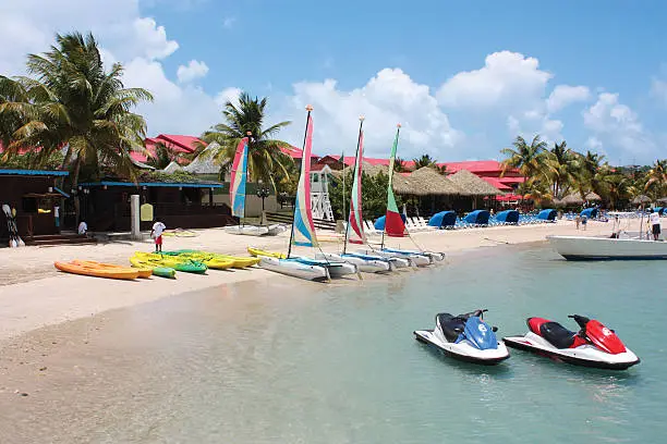 "Several watersports options at a Caribbean resort. Sailing, kayaks and jet skis.Click Here For More Caribbean Images!"