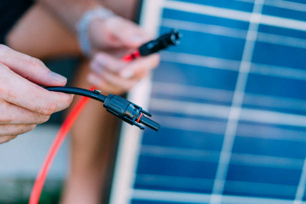 istock Waterproof MC4 Connector on the Negative Side of a Solar Panel Electrical Cable 1827707551