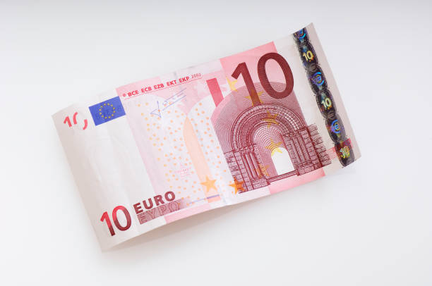 ondulato banconota da dieci euro - euro symbol european union currency currency banking foto e immagini stock