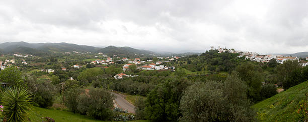 istock Algarve hillside village panorama 182770878