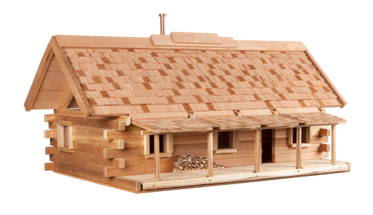 Miniature model of a log cabin.