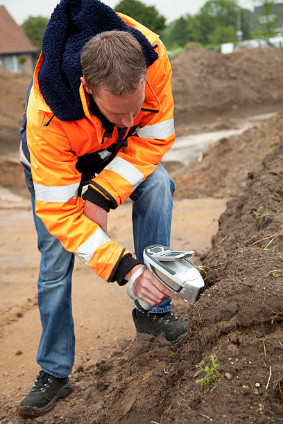 istock Analysing the soil with H-XRF and taking samples, environmetal research. 182771472