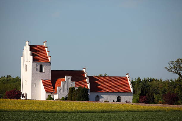 istock Idyllic country side parish church in evening sun 182771818