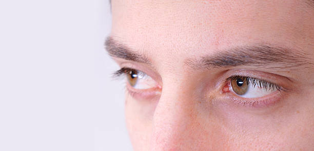 istock eyes of a man isolated on white 182771877
