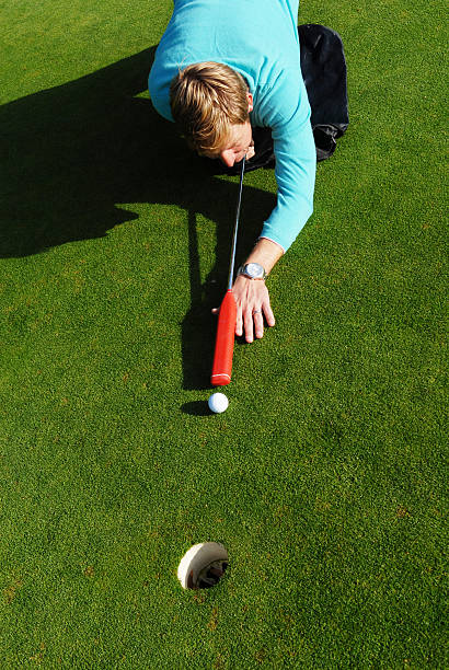 istock New way of putting like billiard pool 182773870