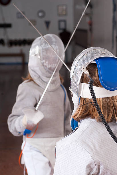 istock Two Girls Fencing 182774371
