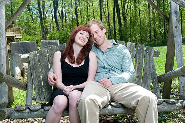 istock Cute Couple on Swing in Nature 182774476
