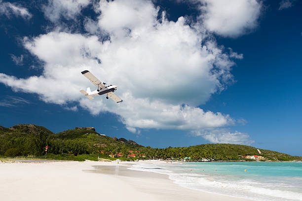 istock airplane taking off from the airport in St. Barths 182774923