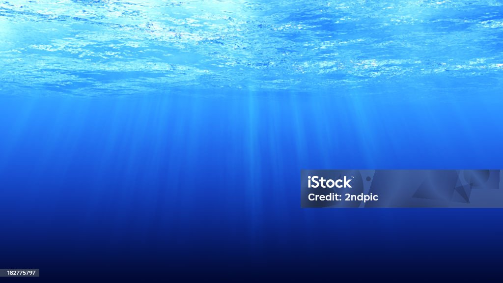 Underwater Underwater scene with light rays. Low Angle View Stock Photo