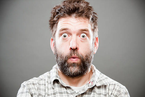 Yikes Rather sketched out looking man. man beard plaid shirt stock pictures, royalty-free photos & images