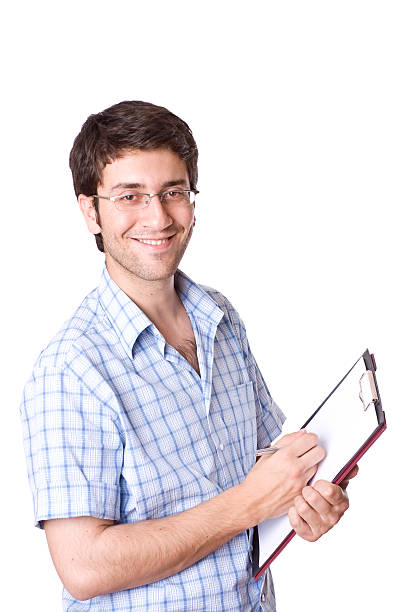 istock Smiling young adult holding a clipboard 182778690