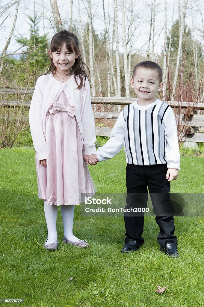 Sunday Finest kids in sunday best / that is their fancy clothing / and they're holding hands 2-3 Years Stock Photo