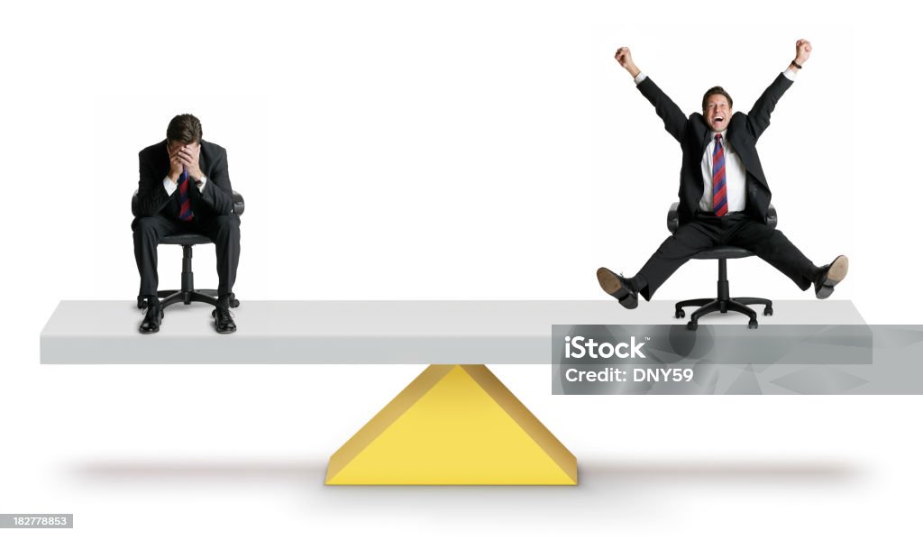 Agony and Ecstacy A businessman exhibiting the thrill of victory and the agony of defeat. Balance Stock Photo