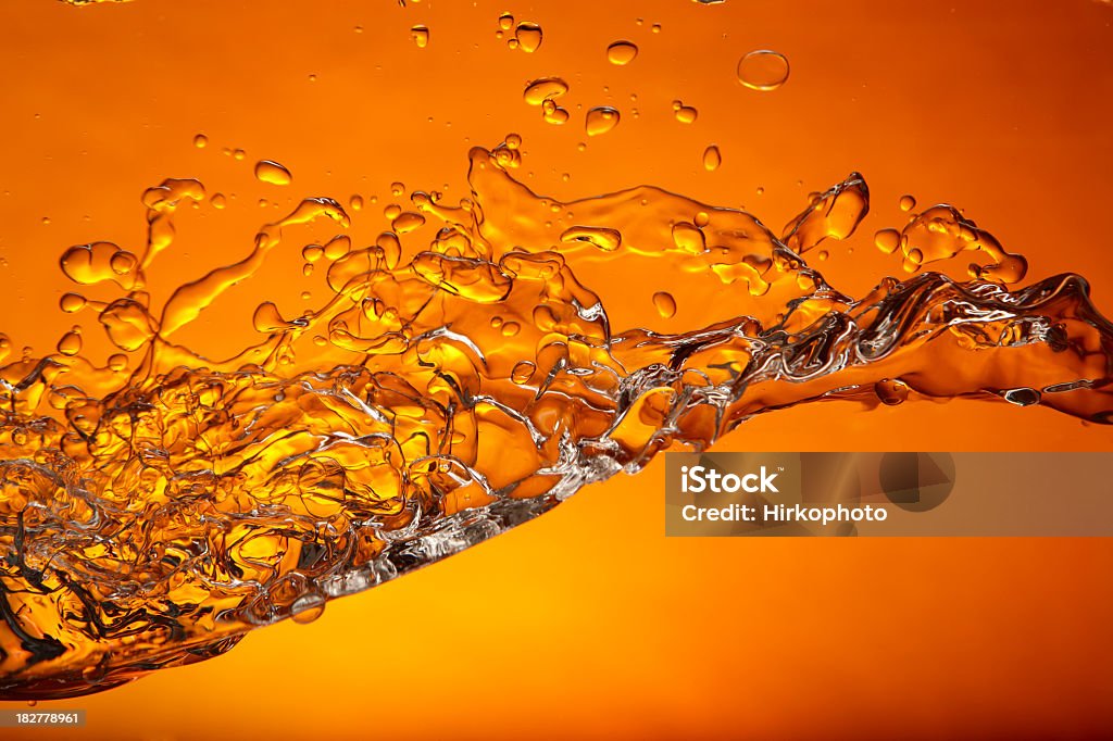 Arancione a spruzzo - Foto stock royalty-free di Arancione