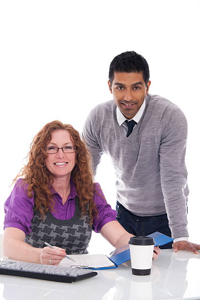 Man and Woman in an Office stock photo