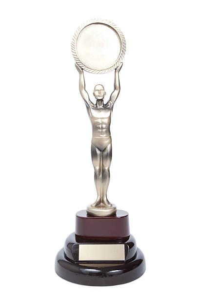 istock Award trophy with silver figure holding a circle above head 182779261