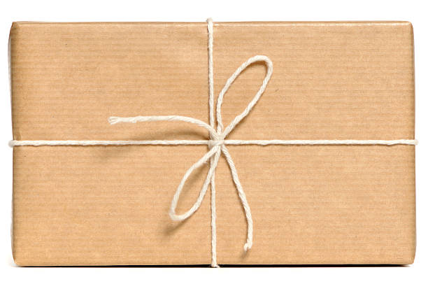 istock Parcel wrapped in brown paper and tied up with string  182779458