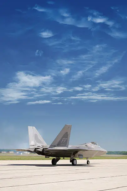 An F-22 Raptor jet prepares for take off.