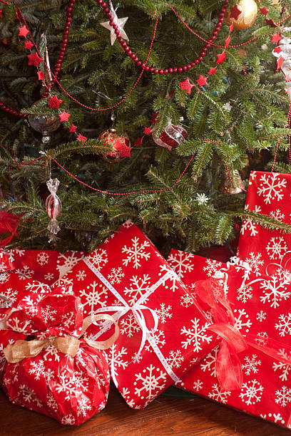 istock Christmas Gifts Under a Tree 182779825