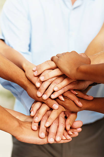 istock Close-up of business hands together in unity 182780244