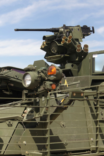 M2 .50 caliber machine gun and grenade launcher mounted on U.S. Army M1126 infantry carrier vehicle.