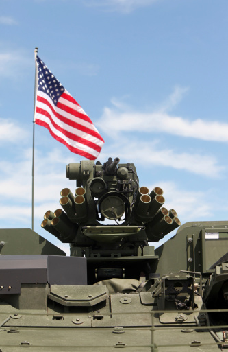 M2 .50 caliber machine gun and grenade launcher mounted on U.S. Army M1126 infantry carrier vehicle.