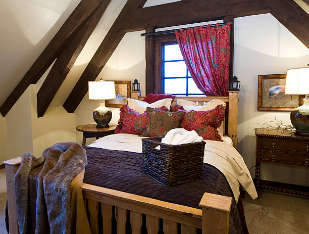 istock Bed in vaulted bedroom 182781630