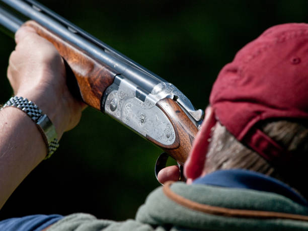 istock Man clay pigeon shooting 182782381