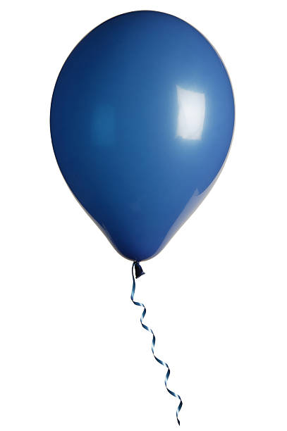 blue balloons on a string against a green lawn