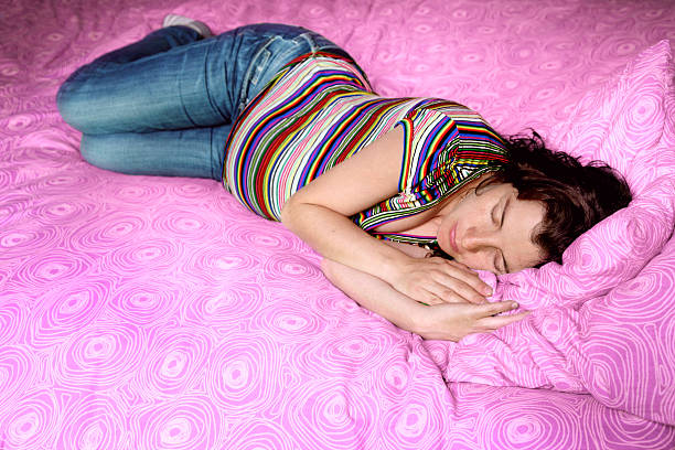 istock Pregnant woman sleeping 182782403