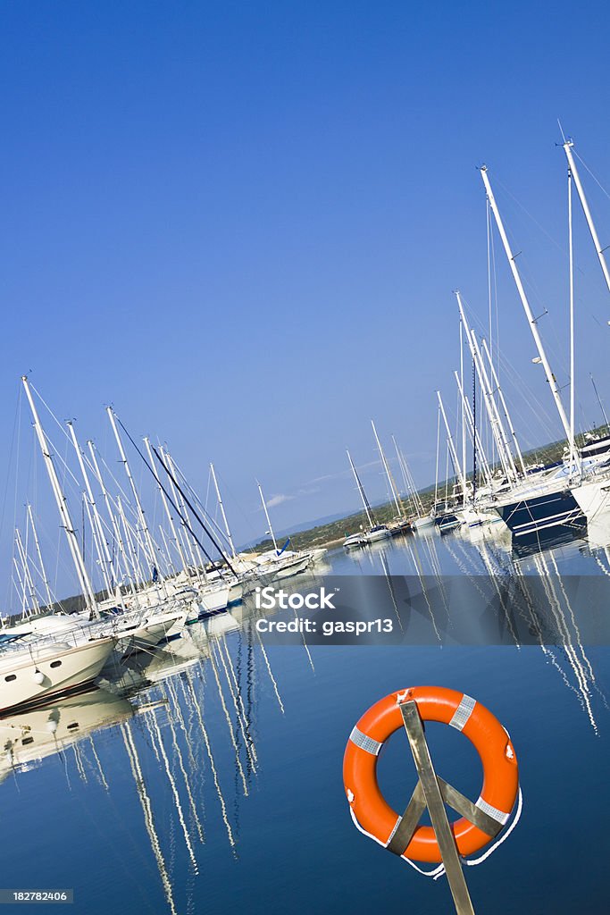 reflections reflections in marina on a beautiful sunny dayCHECK OTHER SIMILAR IMAGES IN MY PORTFOLIO.... Blue Stock Photo