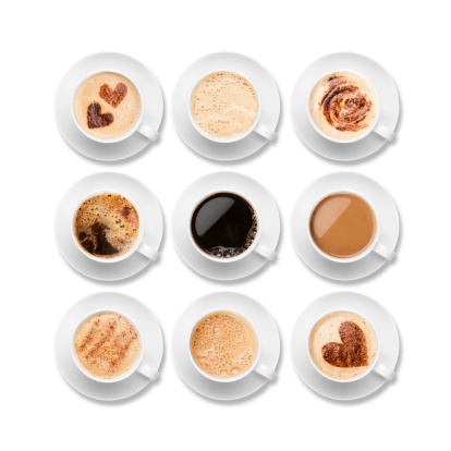Nueve diferentes de café en blanco con saucers recipientes photo