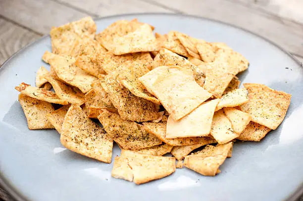 A plate of spice/herbed pita chips