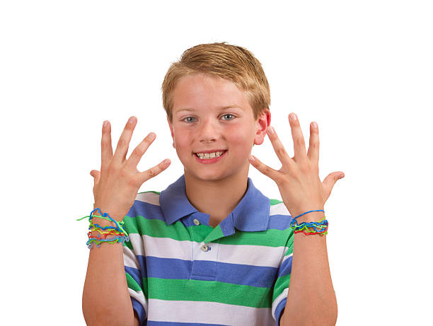 istock Child With Shape Rubber Band Bracelets On Both Arms 182784083