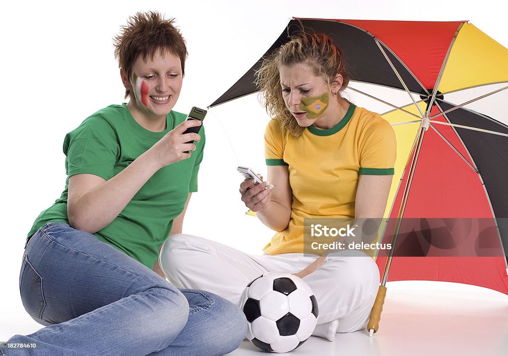 Soccer fans Soccer fans receive results on the phone. Accessibility Stock Photo