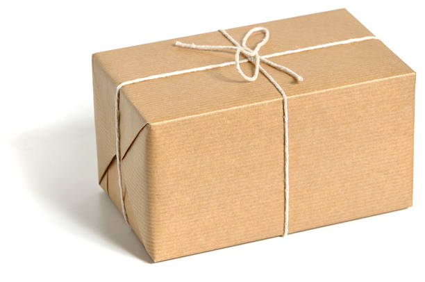 коричневый завёрнутый parcel - string package brown paper стоковые фото и изображения