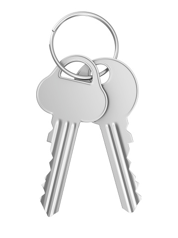 isolated silver house keys front view.