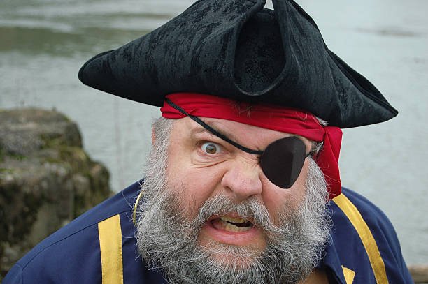 Arrrrrgh! "Scurvy dog pirate says ""arrrrgh!""" one eyed stock pictures, royalty-free photos & images