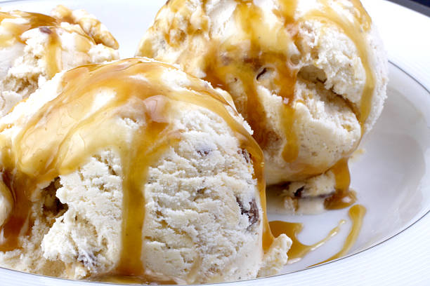 scoops of ice cream with caramel sauce.