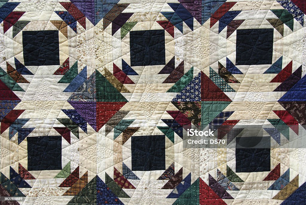 Pineapple Quilt Pattern Colorful hand crafted quilt Quilt Stock Photo