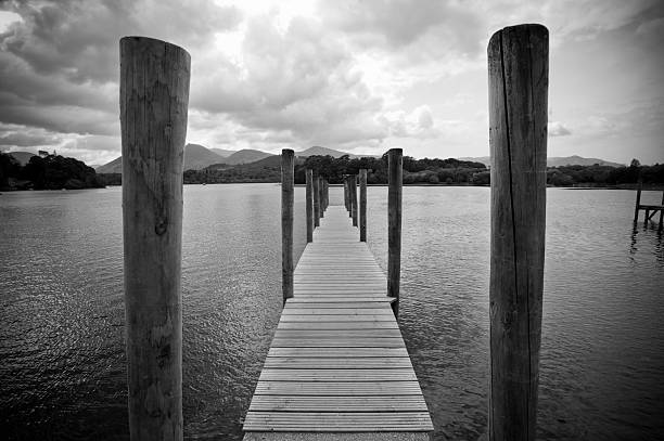 Derwent Water Pier "One of the many piers at Derwent Water, Keswick in the Lake District.-" keswick stock pictures, royalty-free photos & images
