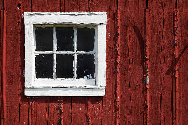 istock Old Red Rustic Barn Window; World's Worst Paint Job 182787827
