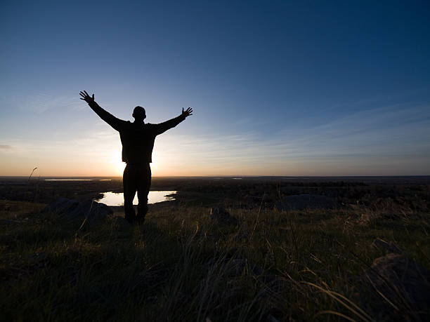 blessed leben - applauding contemplation praying arms outstretched stock-fotos und bilder