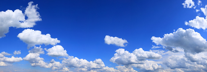 Panorama of sky with clouds, nature background. Wide panoramic landscape with a beautiful sky for your weather banner or billboard.
