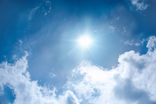istock XXXL Sunshine background with some clouds 182788350